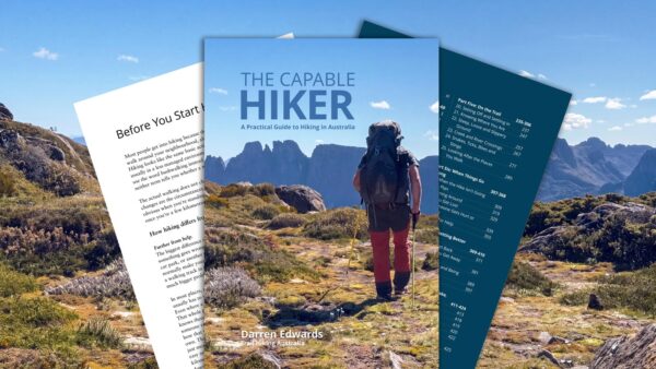 book-promo-the-capable-hiker Cover of "the capable hiker: a practical guide to hiking in australia" by darren edwards, with sample text and contents pages behind it